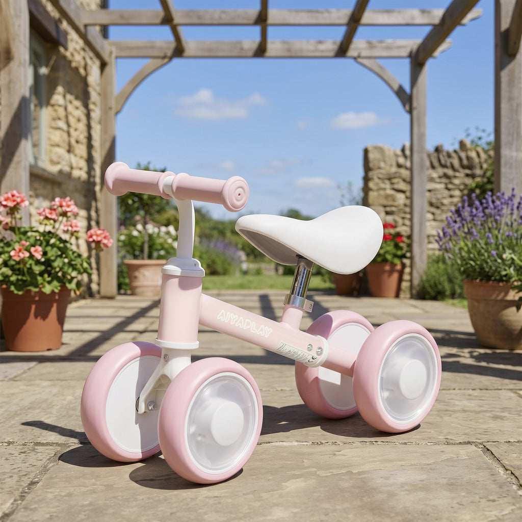 Draisienne Bébé 1-2 Ans, 4 Roues Lumineuses, Siège Réglable, Direction Limitée, Pneus EVA Silencieux, 52x22x37cm, Rose